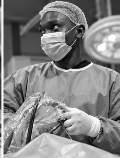 Israel Oheji ABI in surgical attire in an operating theatre